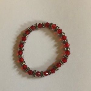 A red and silver Bracelet